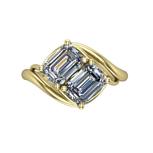 Julianna emerald three stone engagement ring in 14K Yellow Gold, top-down view showing two step-cut emerald diamonds set diagonally in a toi et moi arrangement embraced by polished ribbon shoulders