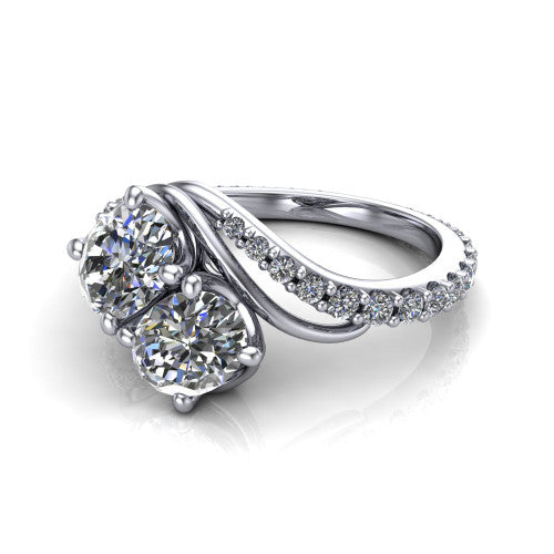 Gwen oval three stone engagement ring in 14K White Gold, three-quarter perspective showing two brilliant oval diamonds set diagonally on a pave wraparound shank with bypass curving shoulders