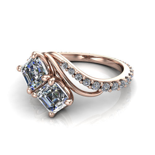 Gwen square emerald three stone engagement ring in 14K Rose Gold, three-quarter perspective showing two step-cut square emerald diamonds set diagonally on a pave wraparound shank with bypass curving shoulders