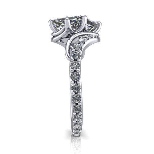 Gwen square emerald three stone engagement ring in Platinum, side profile showing the bypass curving shoulders and pave diamonds wrapping the top and outer sides of the shank