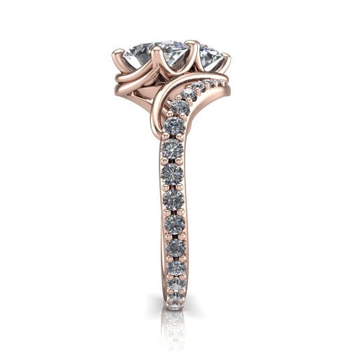 Gwen oval three stone engagement ring in 14K Rose Gold, side profile showing the bypass curving shoulders and pave diamonds wrapping the top and outer sides of the shank