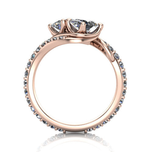 Gwen oval three stone engagement ring in 14K Rose Gold, through-finger front profile showing the two-stone head and pave wraparound band