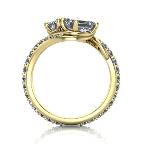 Gwen emerald three stone engagement ring in 18K Yellow Gold, through-finger front profile showing the two-stone head and pave wraparound band