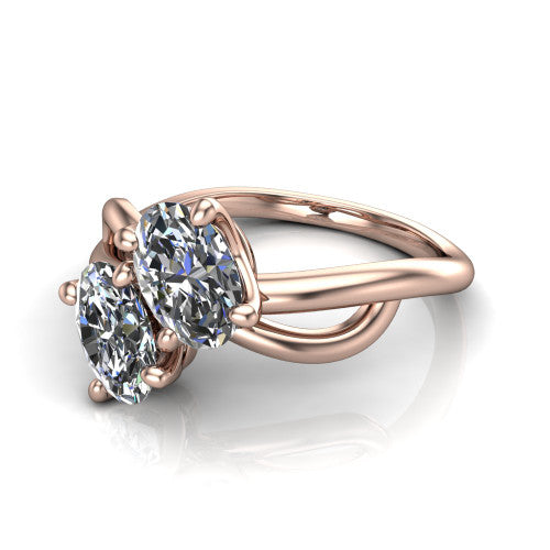Mya oval three stone engagement ring in 14K Rose Gold, three-quarter perspective showing two brilliant oval diamonds set diagonally on a polished infinity-loop shank