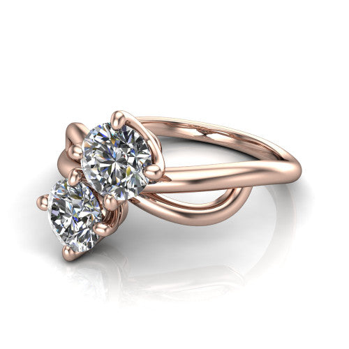 Mya round three stone engagement ring in 14K Rose Gold, three-quarter perspective showing two brilliant round diamonds set diagonally on a polished infinity-loop shank