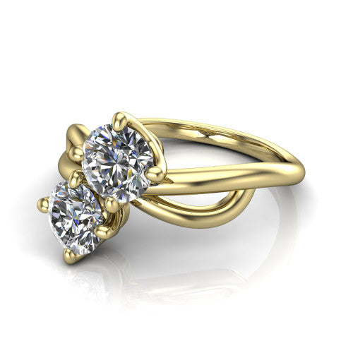 Mya round three stone engagement ring in 14K Yellow Gold, three-quarter perspective showing two brilliant round diamonds set diagonally on a polished infinity-loop shank