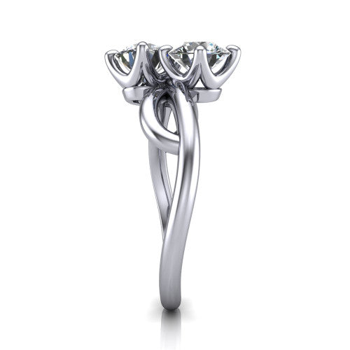 Mya round three stone engagement ring in Platinum, side profile showing the band crossing beneath the head as a smooth polished infinity loop