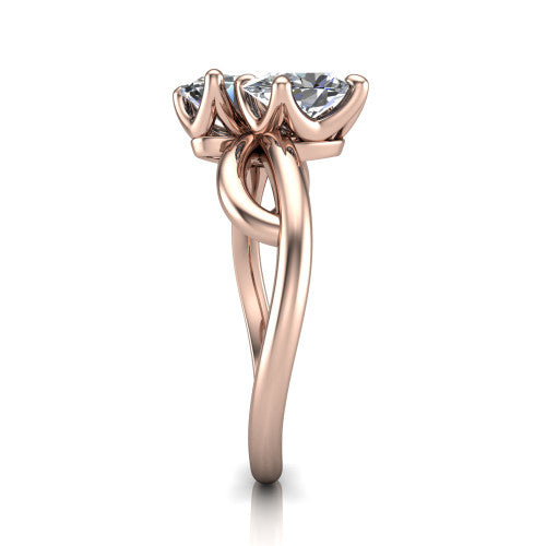 Mya oval three stone engagement ring in 18K Rose Gold, side profile showing the band crossing beneath the head as a smooth polished infinity loop