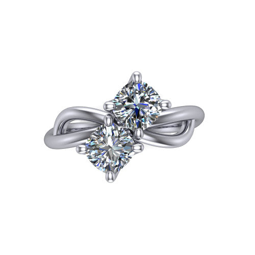 Mya cushion three stone engagement ring in 18K White Gold, top-down view showing two brilliant cushion-cut diamonds set diagonally in a toi et moi arrangement above the infinity-loop shank
