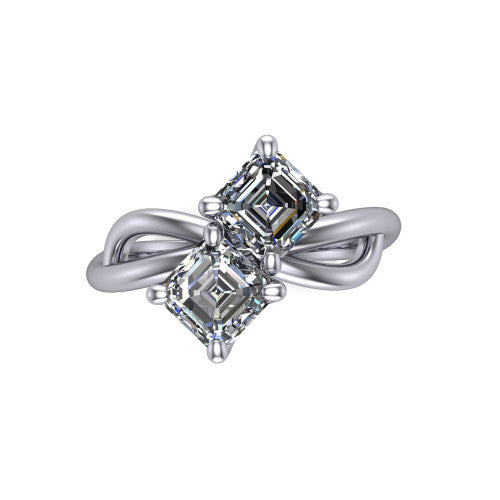 Mya square emerald three stone engagement ring in 18K White Gold, top-down view showing two step-cut square emerald diamonds set diagonally in a toi et moi arrangement above the infinity-loop shank