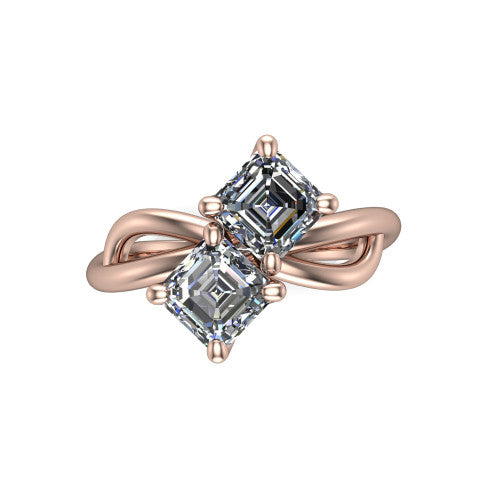 Mya square emerald three stone engagement ring in 14K Rose Gold, top-down view showing two step-cut square emerald diamonds set diagonally in a toi et moi arrangement above the infinity-loop shank