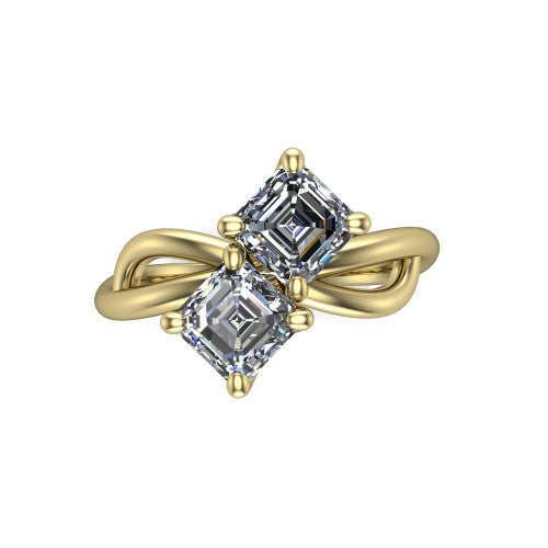 Mya square emerald three stone engagement ring in 18K Yellow Gold, top-down view showing two step-cut square emerald diamonds set diagonally in a toi et moi arrangement above the infinity-loop shank