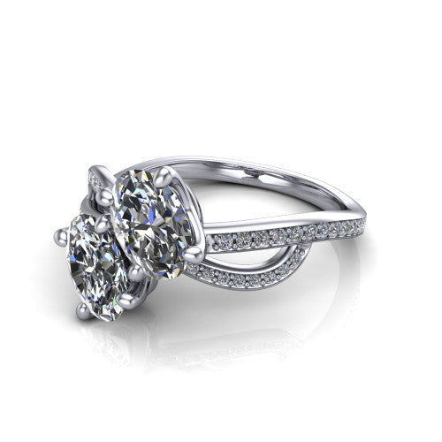 Angelina oval three stone engagement ring in Platinum, three-quarter perspective showing two brilliant oval diamonds set diagonally on a pave infinity-loop shank