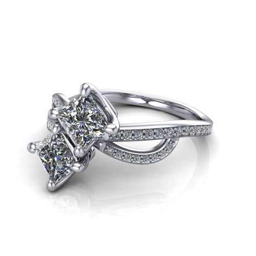 Angelina princess three stone engagement ring in Platinum, three-quarter perspective showing two brilliant princess-cut diamonds set diagonally on a pave infinity-loop shank