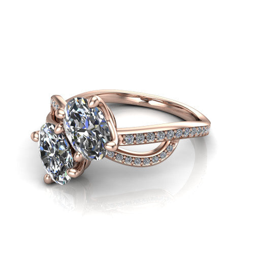 Angelina oval three stone engagement ring in 14K Rose Gold, three-quarter perspective showing two brilliant oval diamonds set diagonally on a pave infinity-loop shank