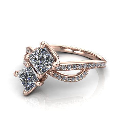 Angelina princess three stone engagement ring in 14K Rose Gold, three-quarter perspective showing two brilliant princess-cut diamonds set diagonally on a pave infinity-loop shank