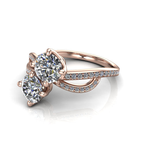 Angelina round three stone engagement ring in 14K Rose Gold, three-quarter perspective showing two brilliant round diamonds set diagonally on a pave infinity-loop shank