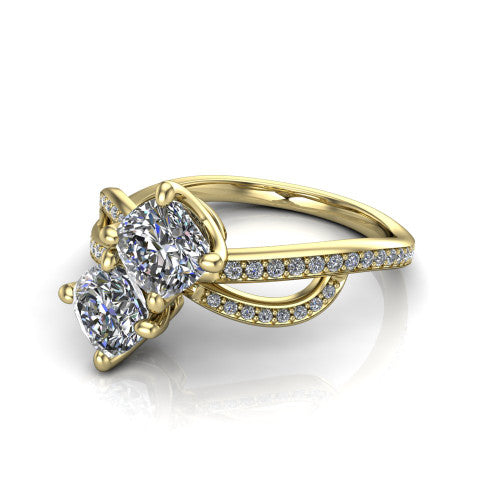 Angelina cushion three stone engagement ring in 14K Yellow Gold, three-quarter perspective showing two brilliant cushion-cut diamonds set diagonally on a pave infinity-loop shank