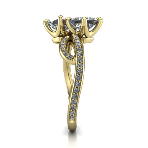 Angelina princess three stone engagement ring in 18K Yellow Gold, side profile showing the band crossing beneath the head as a pave-covered infinity loop