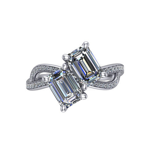 Angelina emerald three stone engagement ring in 14K White Gold, top-down view showing two step-cut emerald diamonds set diagonally in a toi et moi arrangement above the infinity-loop shank