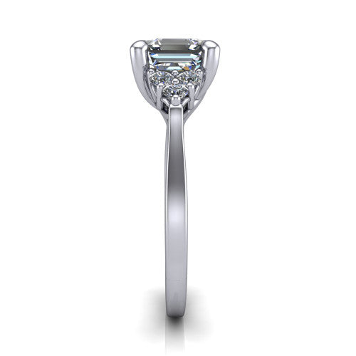 Raegan square emerald three stone engagement ring in 14K White Gold, side profile showing the cluster head, tall basket, and slim polished band
