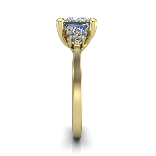 Raegan princess three stone engagement ring in 14K Yellow Gold, side profile showing the cluster head, tall basket, and slim polished band