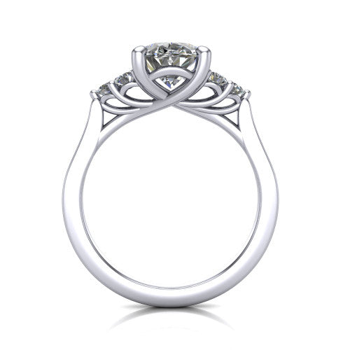 Raegan oval three stone engagement ring in Platinum, through-finger front profile showing the cluster head and tall straight basket