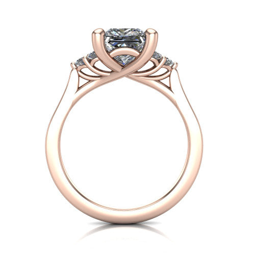 Raegan princess three stone engagement ring in 18K Rose Gold, through-finger front profile showing the cluster head and tall straight basket