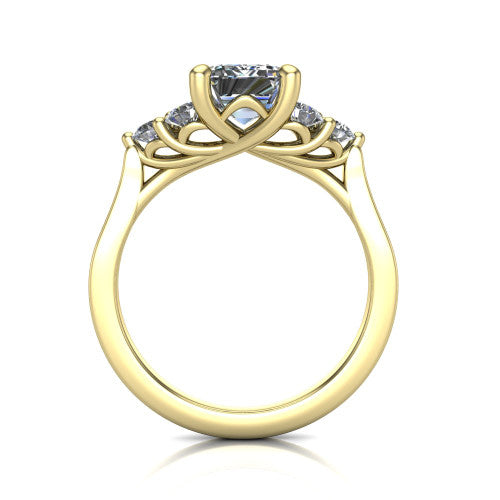 Raegan emerald three stone engagement ring in 18K Yellow Gold, through-finger front profile showing the cluster head and tall straight basket