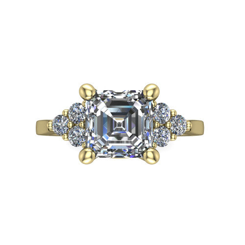 Raegan square emerald three stone engagement ring in 14K Yellow Gold, top-down view showing the step-cut square emerald center diamond with triangular round-diamond clusters on each side