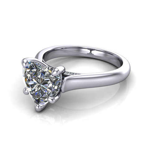 Madilyn heart solitaire engagement ring in Platinum, three-quarter perspective showing the brilliant heart-shaped center diamond on a slim polished plain band