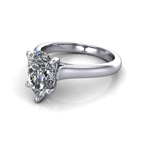 Madilyn pear solitaire engagement ring in 14K White Gold, three-quarter perspective showing the brilliant pear-cut center diamond on a slim polished plain band