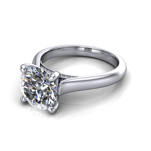 Madilyn round solitaire engagement ring in 14K White Gold, three-quarter perspective showing the brilliant round center diamond on a slim polished plain band