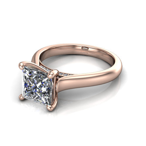 Madilyn princess solitaire engagement ring in 18K Rose Gold, three-quarter perspective showing the brilliant princess-cut center diamond on a slim polished plain band