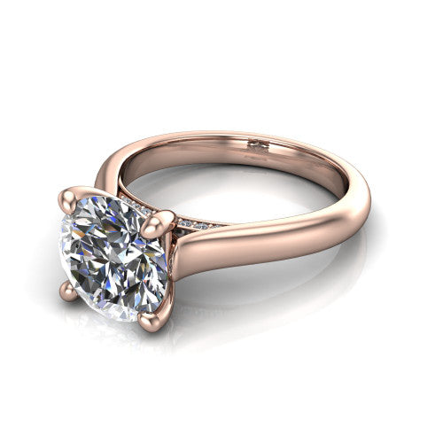Madilyn round solitaire engagement ring in 18K Rose Gold, three-quarter perspective showing the brilliant round center diamond on a slim polished plain band