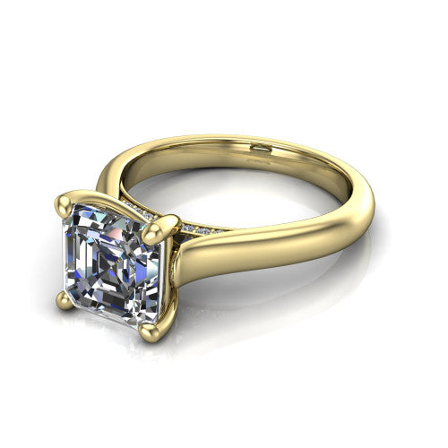 Madilyn square emerald solitaire engagement ring in 14K Yellow Gold, three-quarter perspective showing the step-cut square emerald center diamond on a slim polished plain band