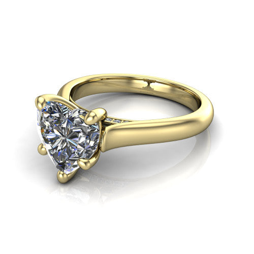 Madilyn heart solitaire engagement ring in 18K Yellow Gold, three-quarter perspective showing the brilliant heart-shaped center diamond on a slim polished plain band