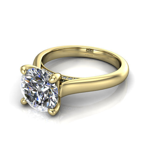 Madilyn round solitaire engagement ring in 14K Yellow Gold, three-quarter perspective showing the brilliant round center diamond on a slim polished plain band