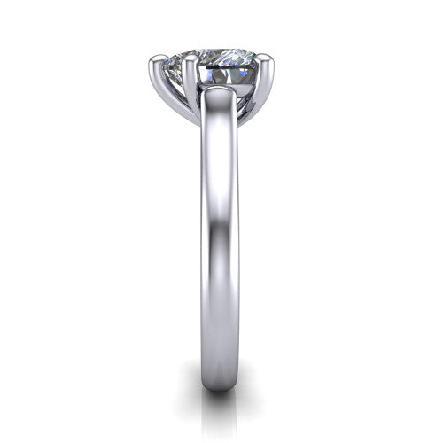 Madilyn heart solitaire engagement ring in Platinum, side profile showing the hidden pave accent under the basket and slim polished plain band