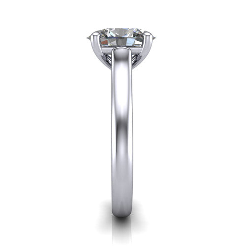 Madilyn oval solitaire engagement ring in 18K White Gold, side profile showing the hidden pave accent under the basket and slim polished plain band