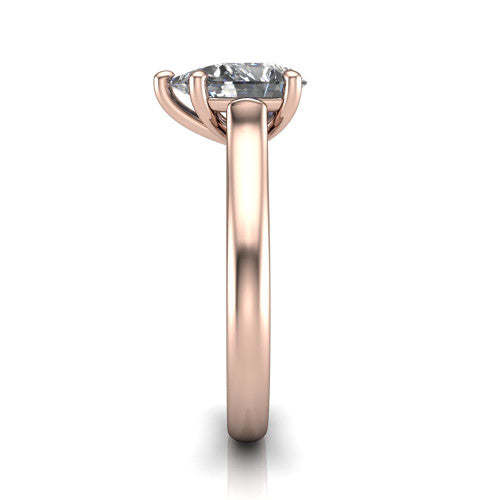 Madilyn pear solitaire engagement ring in 18K Rose Gold, side profile showing the hidden pave accent under the basket and slim polished plain band
