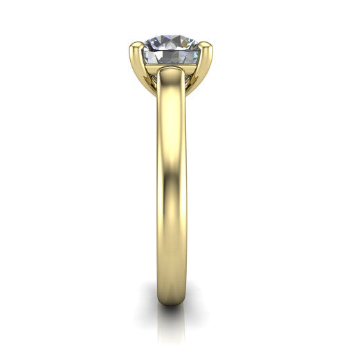 Madilyn round solitaire engagement ring in 14K Yellow Gold, side profile showing the hidden pave accent under the basket and slim polished plain band