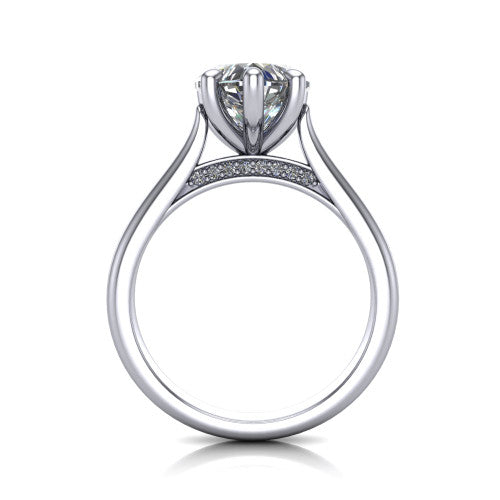 Madilyn heart solitaire engagement ring in 14K White Gold, through-finger front profile showing the hidden pave accent row beneath the basket and open under-gallery