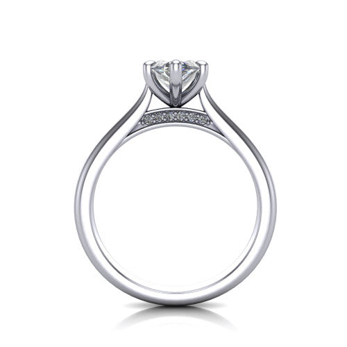 Madilyn marquise solitaire engagement ring in Platinum, through-finger front profile showing the hidden pave accent row beneath the basket and open under-gallery