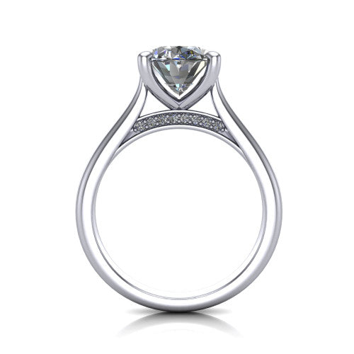 Madilyn oval solitaire engagement ring in 14K White Gold, through-finger front profile showing the hidden pave accent row beneath the basket and open under-gallery