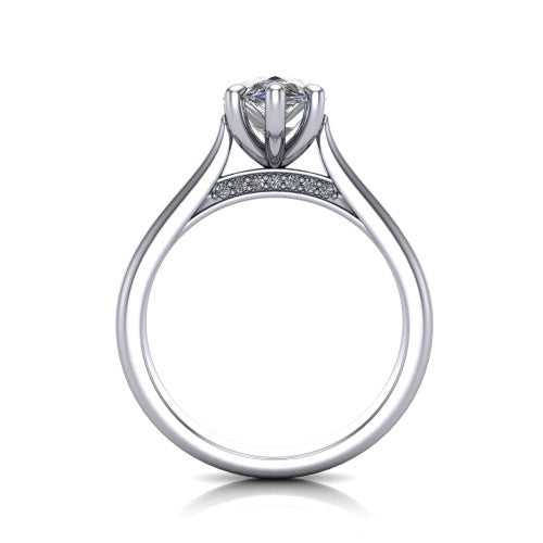 Madilyn pear solitaire engagement ring in 18K White Gold, through-finger front profile showing the hidden pave accent row beneath the basket and open under-gallery