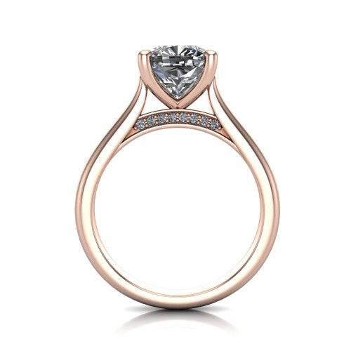 Madilyn cushion solitaire engagement ring in 18K Rose Gold, through-finger front profile showing the hidden pave accent row beneath the basket and open under-gallery