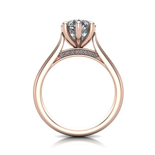 Madilyn heart solitaire engagement ring in 18K Rose Gold, through-finger front profile showing the hidden pave accent row beneath the basket and open under-gallery