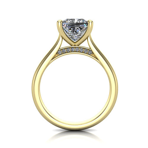 Madilyn princess solitaire engagement ring in 18K Yellow Gold, through-finger front profile showing the hidden pave accent row beneath the basket and open under-gallery