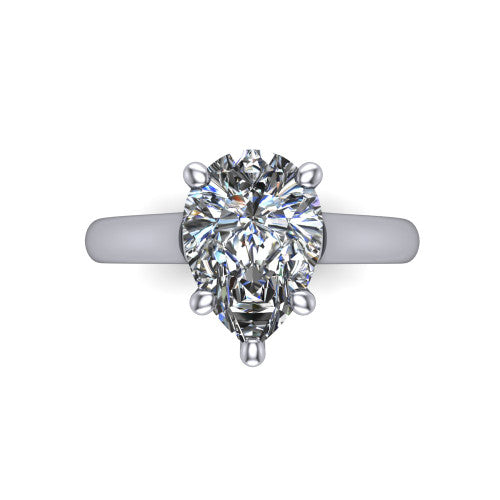 Madilyn pear solitaire engagement ring in 18K White Gold, top-down view showing the brilliant pear-cut center diamond held by four prongs above the plain band